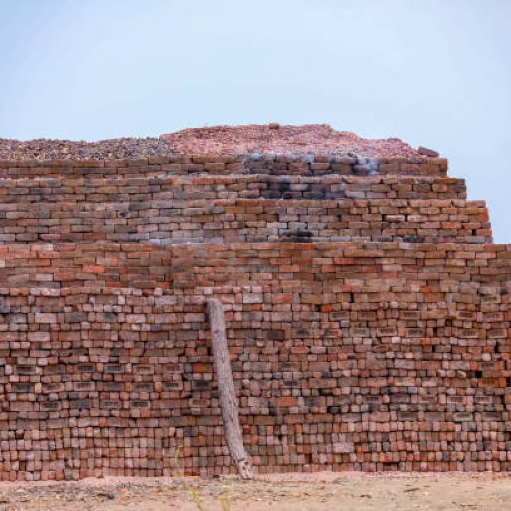 Old red brick wall background texture close up